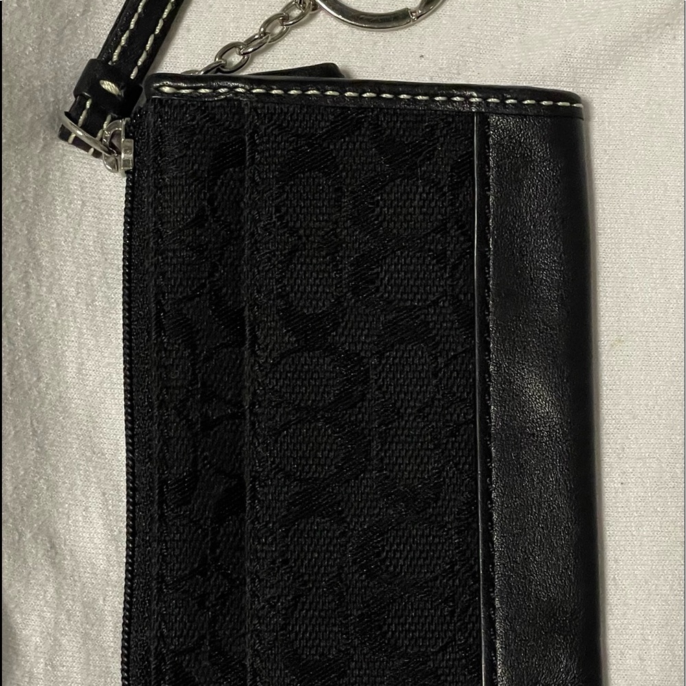 Black, Coach change purse. Never been used.